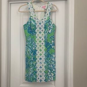 Green and Blue Sleeveless Dress with White Lace Detail